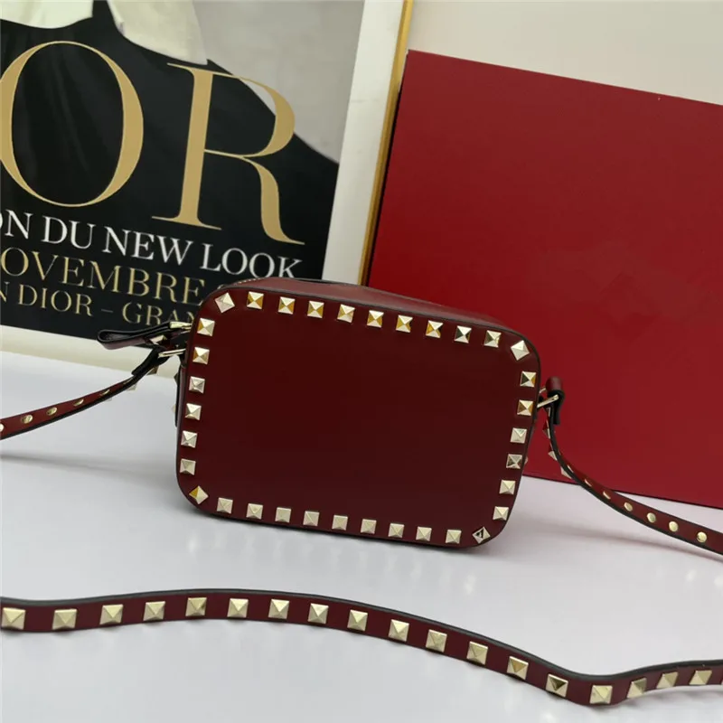 

Luxury star in the same style Fashion cowhide camera bag with rivets slanting across small square bag Top quality Women's bag