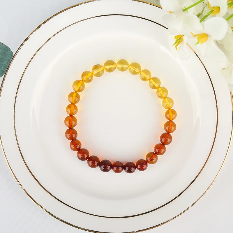 

Natural Russian amber beeswax gold amber blood amber bracelets old round beads single circle men and women bead bracelets