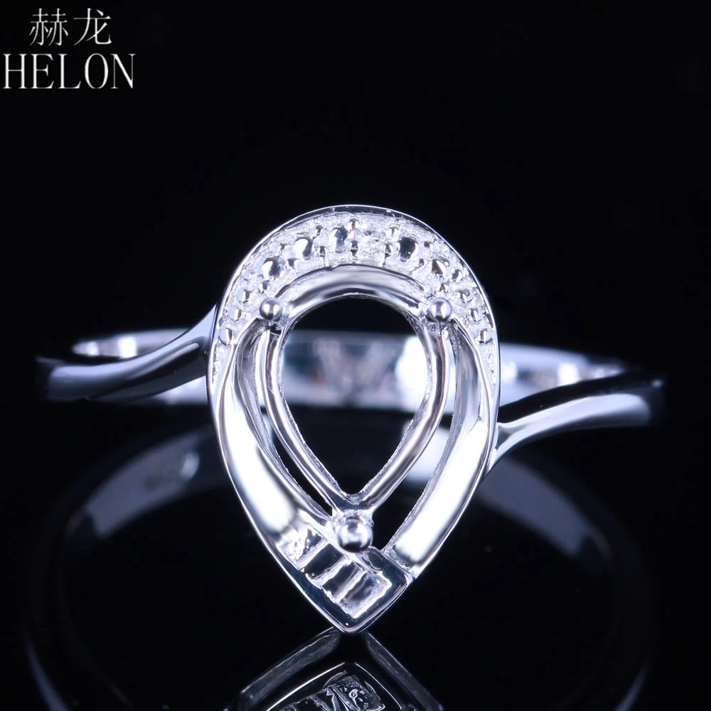 

Кольцо HELON из белого золота с натуральными бриллиантами, 7 Х5 мм