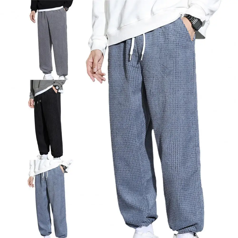 

Брюки мужские однотонные с поясом на резинке и завязками