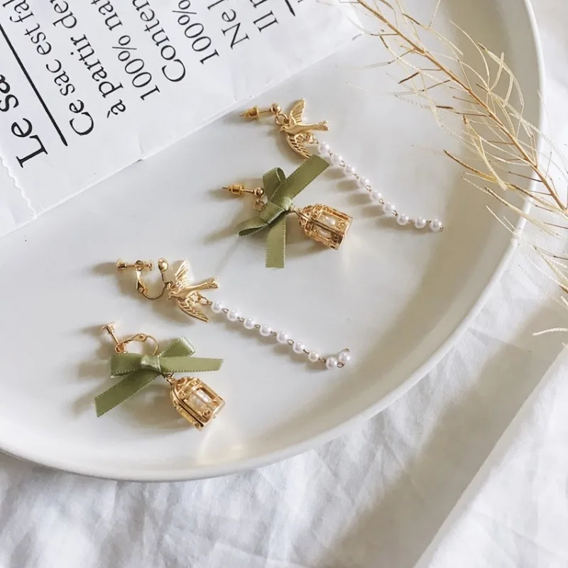 Модные корейские ювелирные изделия асимметричный бант клетка для птиц клипсы