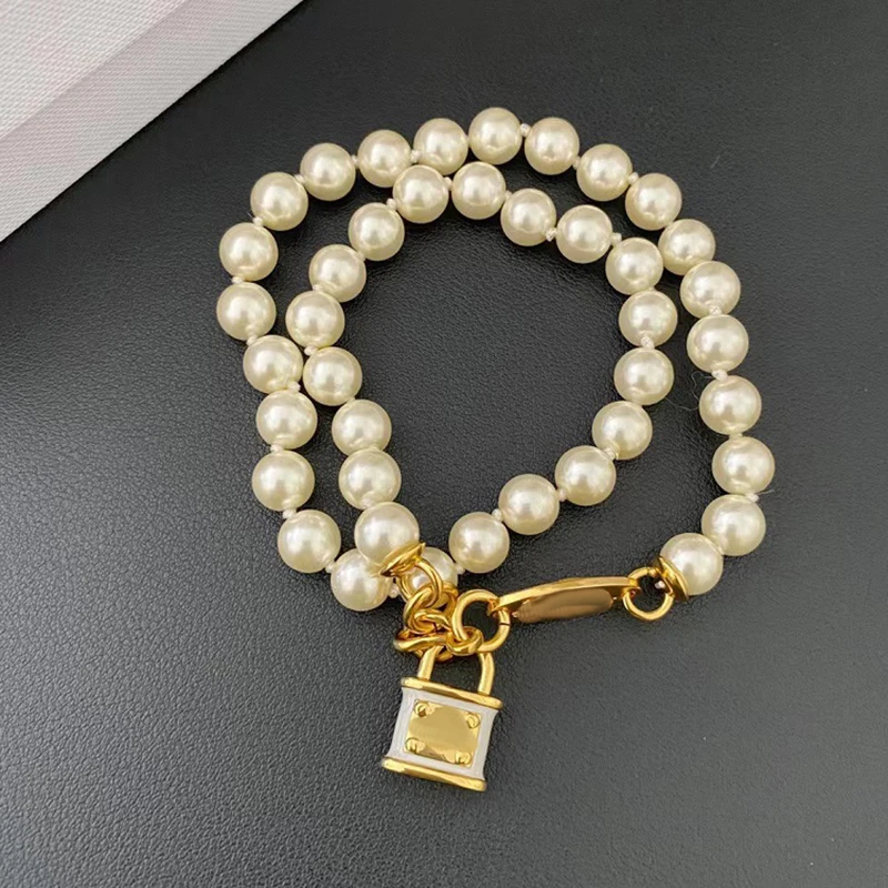 

Королева-мать Вивьен Сатурн трехмерное жемчужное ожерелье с замком премиум ретро эмаль универсальное