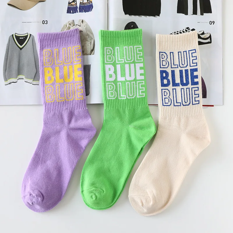 

Women fashion cotton socks new solid color letters Street men medium tube socks leisure sports Harajuku skateboard female socks