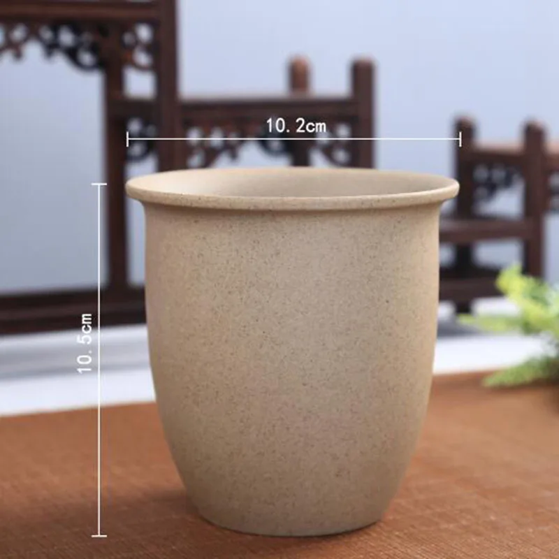 

Коричневый керамический горшок для растений