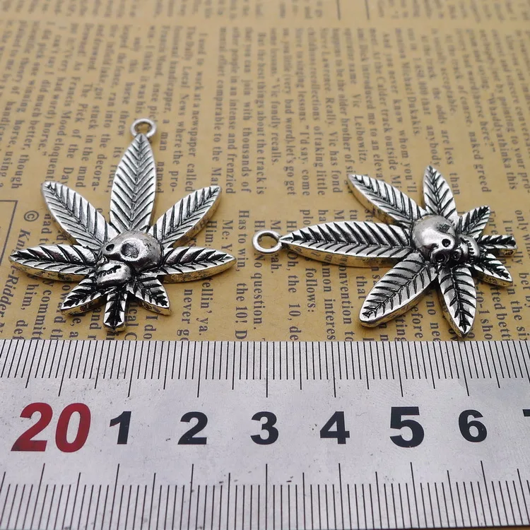 

2pcs/Lot 37x47mm Antique Silver Color Maple Leaf Skull Head Bone Charms Pendant For Jewelry Making DIY Jewelry Findings