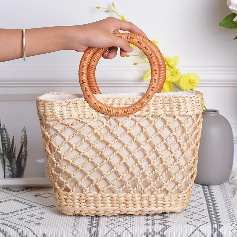 

Lovevook women handbag woven straw bags with top-handle hollow out summer beach bags for travel/picnic bamboo and rattan bags