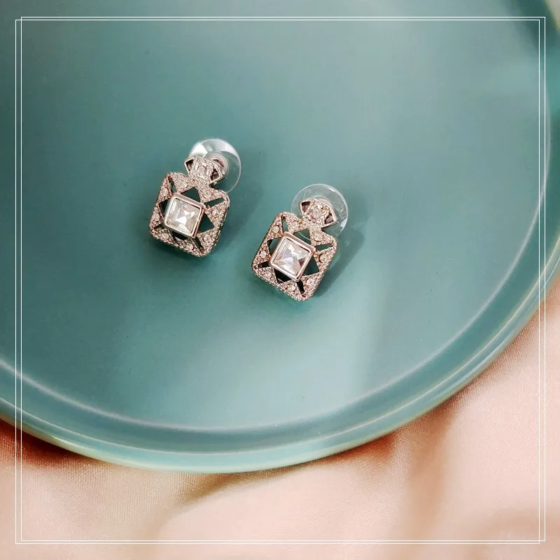 

New metal fashion crystal hits mark perfume bottle modelling female ear nail