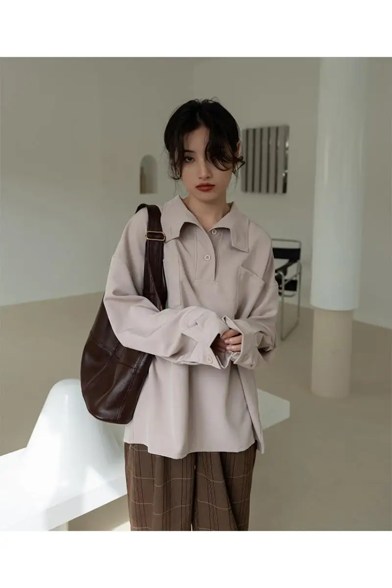 

2021 spring new Korean style stand-up collar design sense niche solid color casual top loose wild long-sleeved shirt women