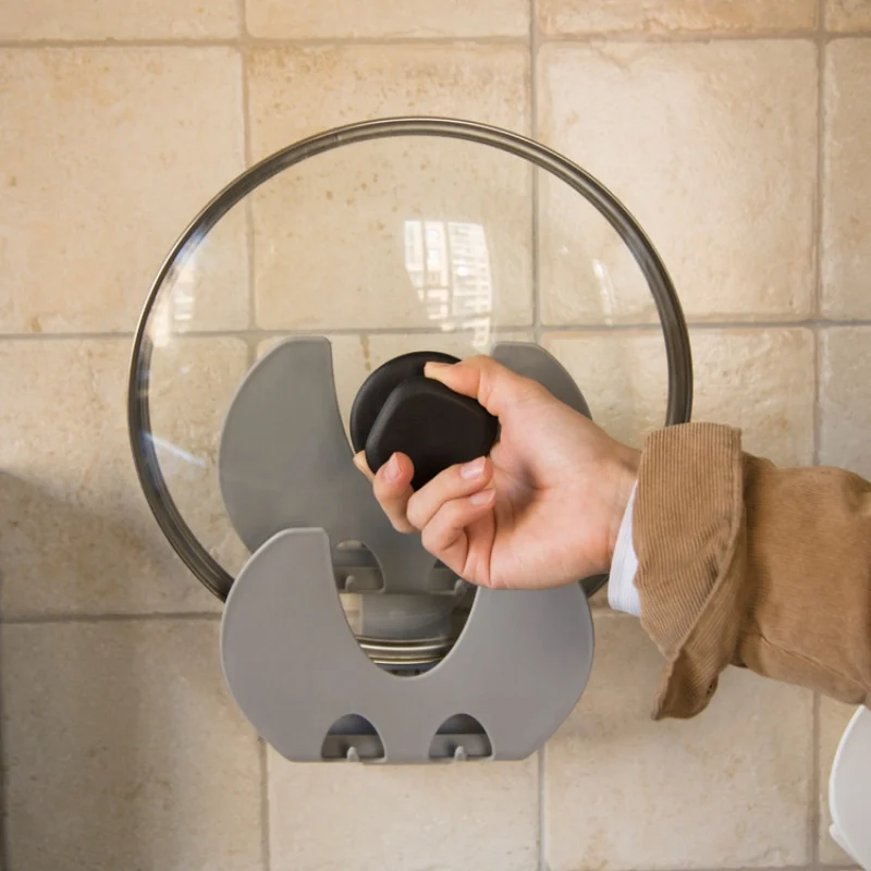 

Punch-Free Plastic Pot Lid Holder Kitchen Supplies Shelf Suction Cups Pot Lid Racks.
