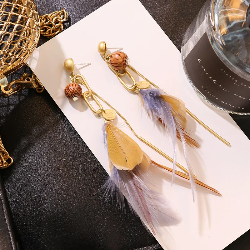 Длинные серьги с бахромой и золотыми перьями в стиле холодного ветра новые
