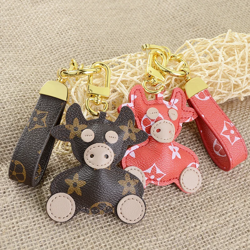 

Кожаный цветочный брелок для ключей из телячьей кожи с мультяшным рисунком Милая подвеска в сумку кольцо для ключей для автомобиля украшен...