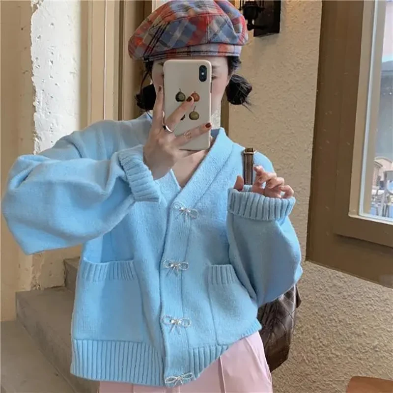 

Женский осенне-зимний Однотонный свитер оверсайз на пуговицах с бантом, корейский Синий студенческий свитер с V-образным вырезом, модный св...