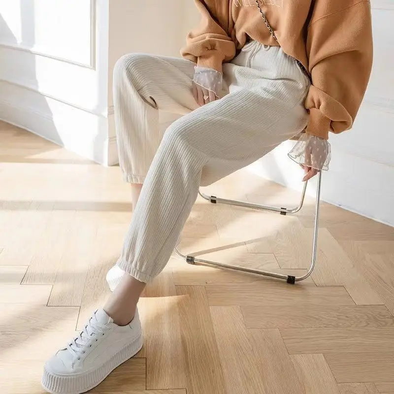 

High waist pants leisure sports pants women's autumn and winter loose add velvet bunched feet Harem Pants thickened show thin ra