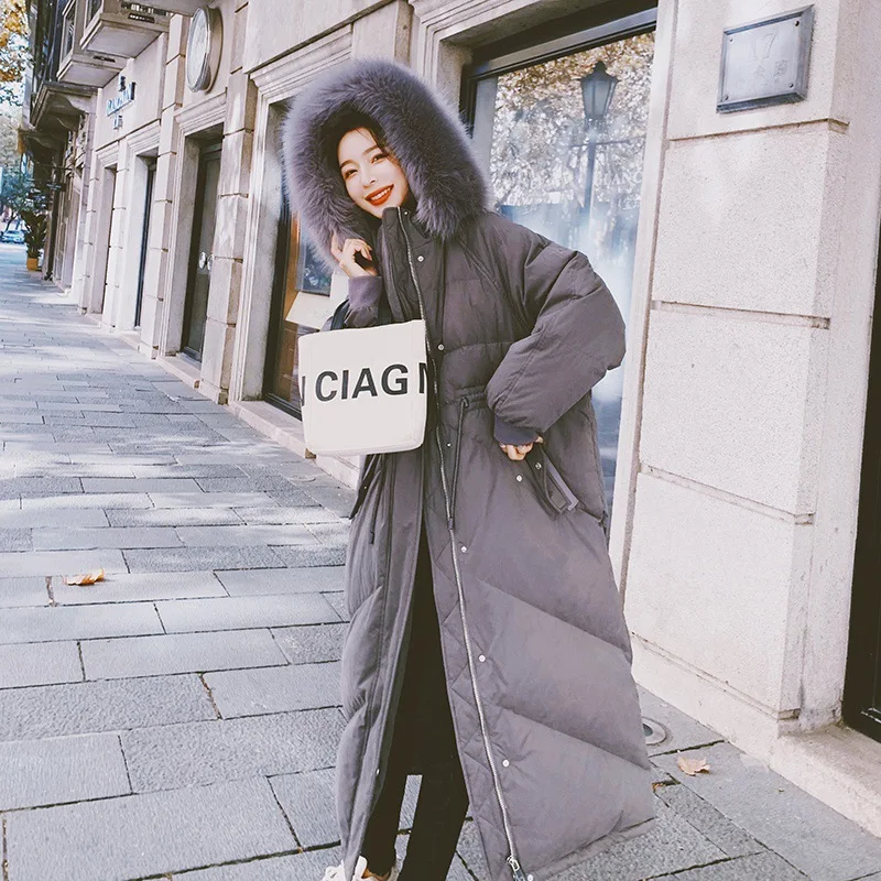 

Down jacket women trend 2020 new medium and long thick bread jacket Korean version loose knee cotton padded jacket