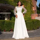 Шифоновое платье А-силуэта в стиле бохо с длинными рукавами-фонариками и открытой спиной, длиной до пола и круглым вырезом