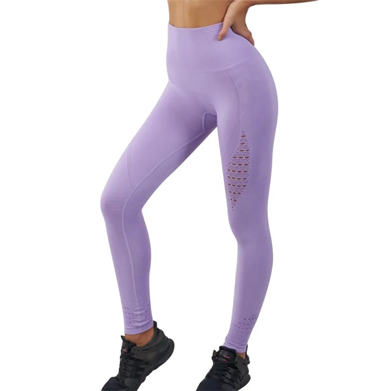 

Seamless hollow fitness pants Europe and the United States training fitness clothes high elastic tight hips nine points pants