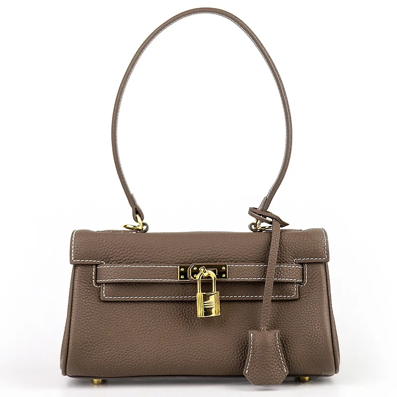 

2021 New Texture Niche Design Underarms Baotou Layer Kelly Bag Tide Shoulder Diagonal Portable Leather Bag Women