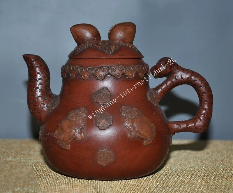 

wedding decoration China Yixing Zisha pottery carved beast Dragon turtle peach Teapot tea pot maker