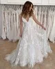

2021 Elegant Wedding Dresses Backless Lace Spaghetti Strap Sleeveless Appliques Beaded Sequins A-line Court Train Bridal Gowns