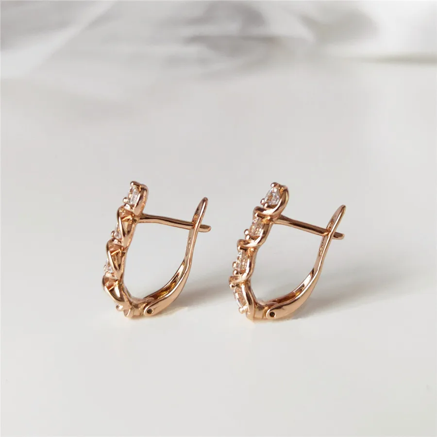 Серьги-гвоздики из розового золота 585 пробы с инкрустацией циркона праздничный