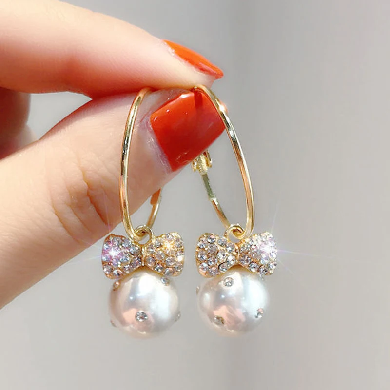 

Women's earrings korean fake pearl earrings butterfly Earrings personality Bling Zircon Stone Stud Earrings Statement Earrings