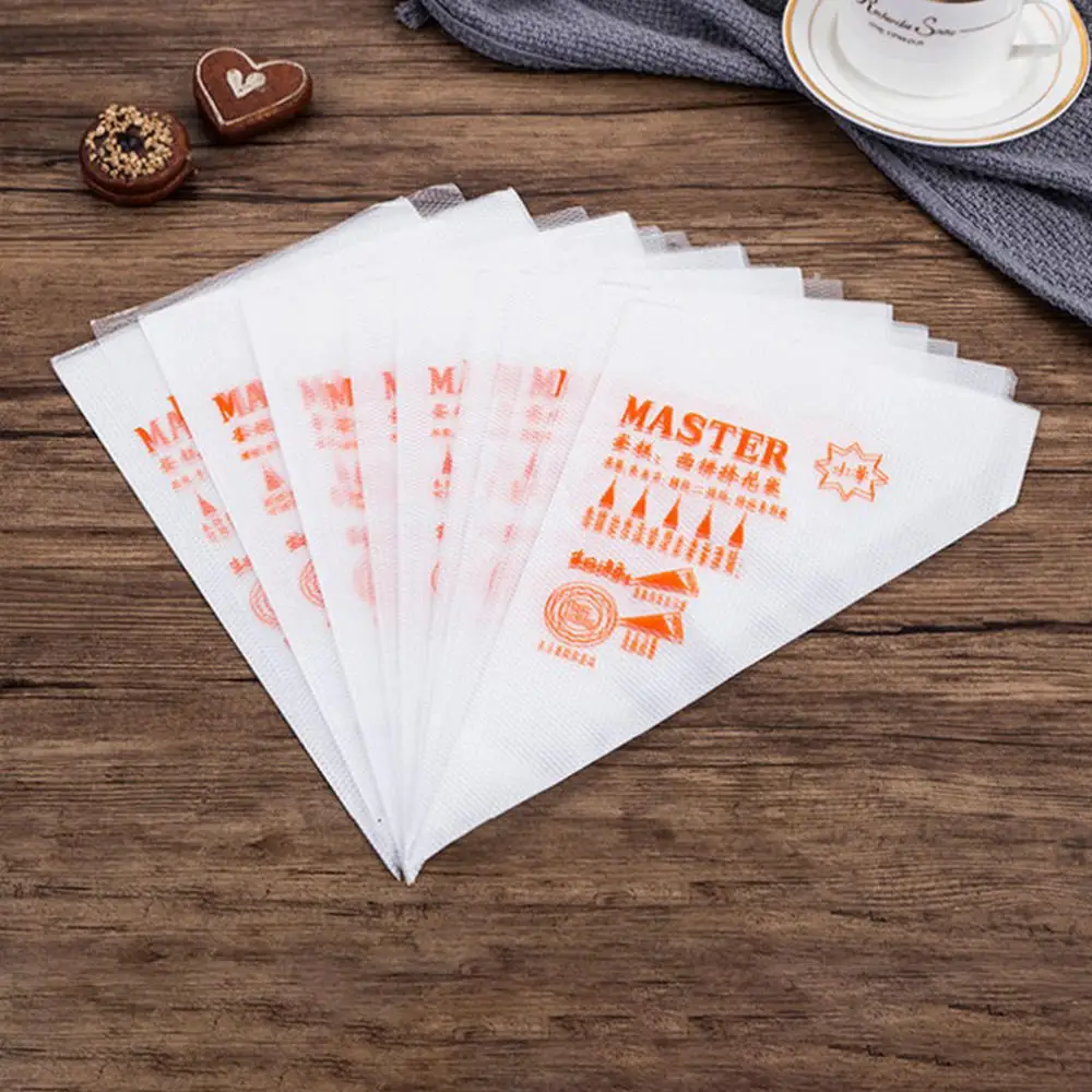 

100pcs Disposable Piping Bag Pastry Bag Icing Piping Fondant Cake Cream Bag Cupcake Decorating Tools Cake Nozzles Pastry Bags