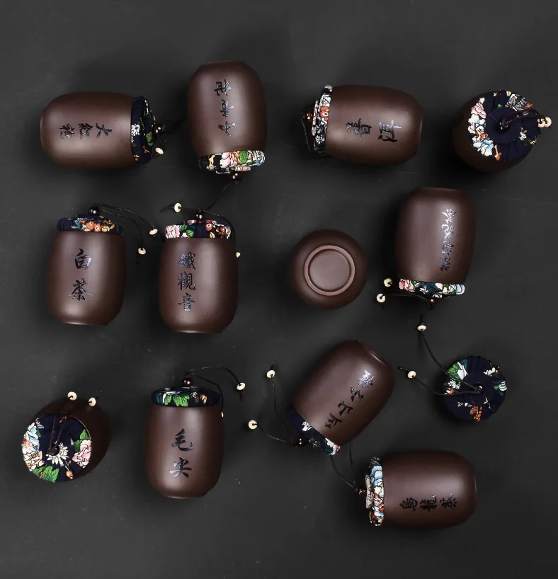 

Small Pu'er tea box purple sand tea pot ceramic tea pot portable mini travel storage sealed pot household use