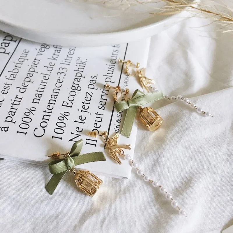 Модные корейские ювелирные изделия асимметричный бант клетка для птиц клипсы