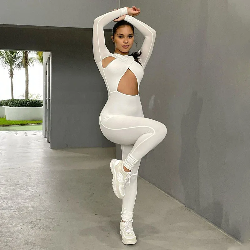 

2021 Solid Hollow Out Revealing Long Sleeves Slim Bodycon Jumpsuit Summer Women Fashion Sexy Sport Party Club Robe Y2K