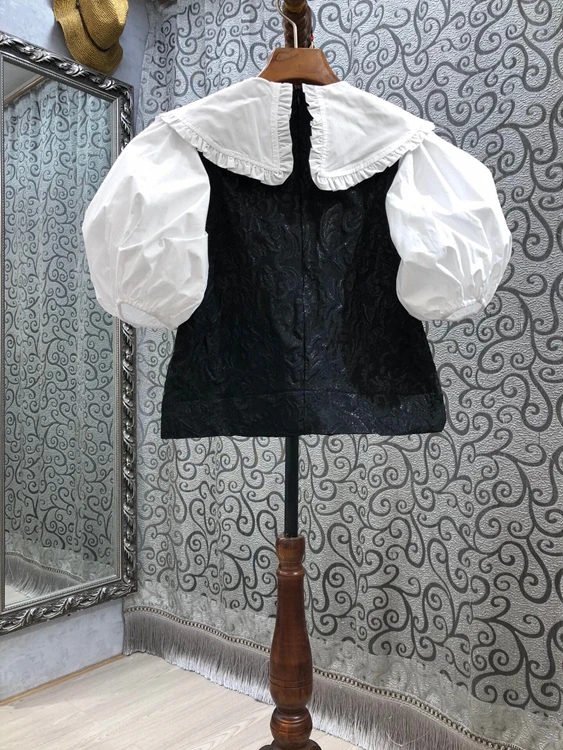 

2021 spring and summer new women's big Lapel color matching decorative bubble sleeve versatile short top 318