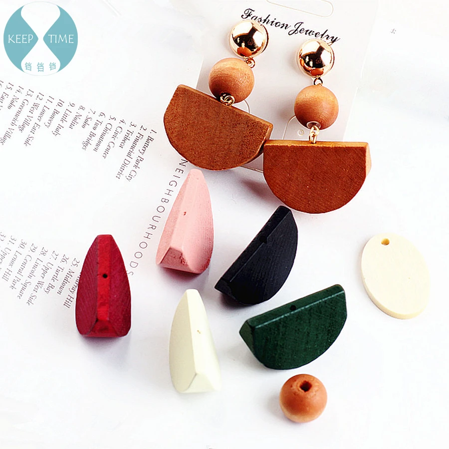 

DIY accessories Korean wood bead perforation elliptical earrings earrings pendant pendant half material