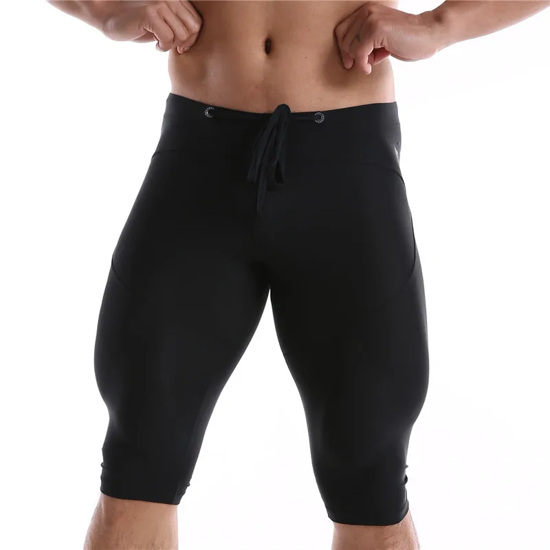 

Men Tight Sports Casual Shorts Ice Silk Knee Length Solid Color Nylon Elastic Waist Sexy Mid Short Men's Cycling Skinny Shorts