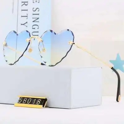 

Frameless Sunglasses For Women Metal Trimming Sunglasses Fashion Personality Street Photography Europe and America 2021 New