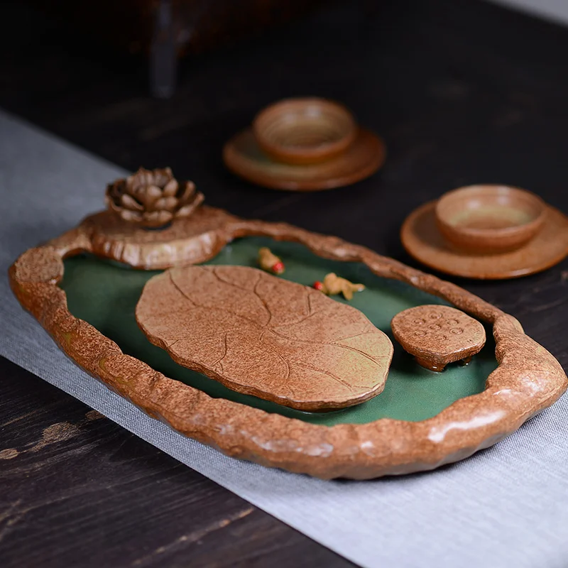 

Japanese style lotus leaf rough pottery pot bearing tea tray water storage type tea sea dry bubble table pot supporting pad