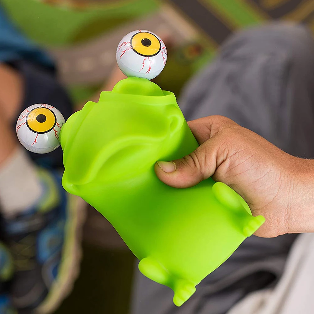 Милая выскакивающая лягушка динозавр с большими глазами снятие стресса