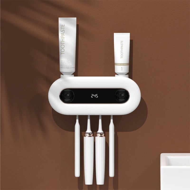 

Toothbrush Holder & UV Light Cleaner Automatic Toothpaste Dispenser Wall Mount USB Charging Toothpaste Dispenser Squeezer