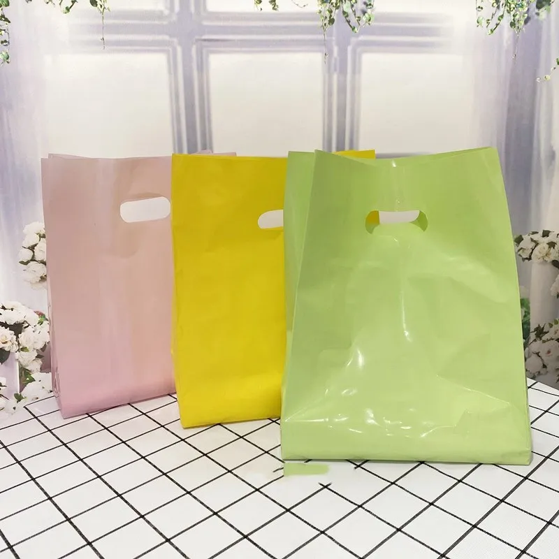 

50pcs Thick Plastic Bags 15x25x3cm Solid color Jewelry Packaging Bags Shopping Plastic Gift Bag with Handle