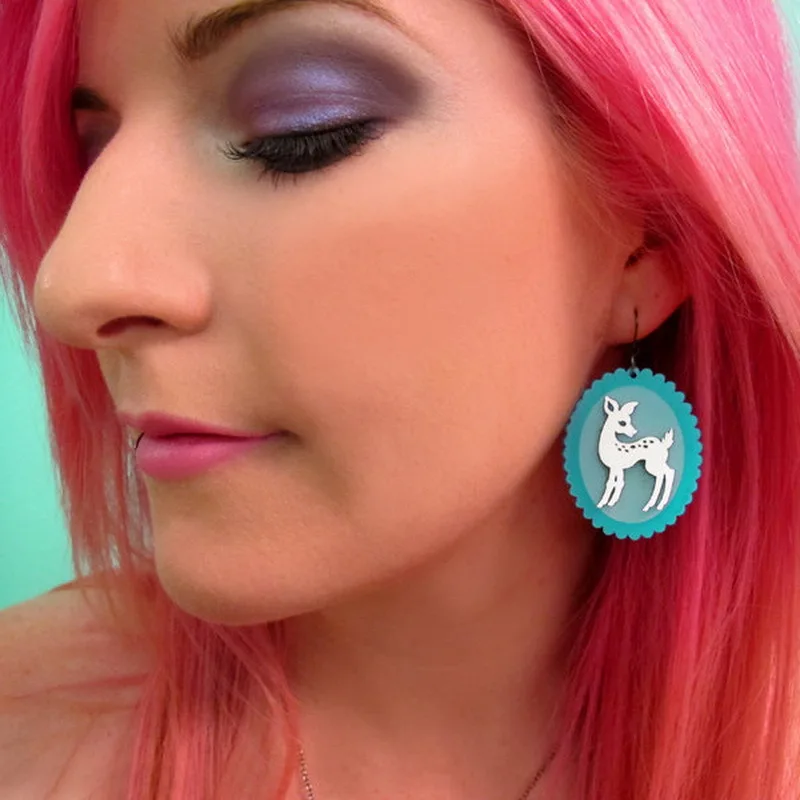 

KDG Western Cowboy Novelty Earrings Wave Oval Elk Earrings Female Gufengsen Small Fresh Personality Earrings