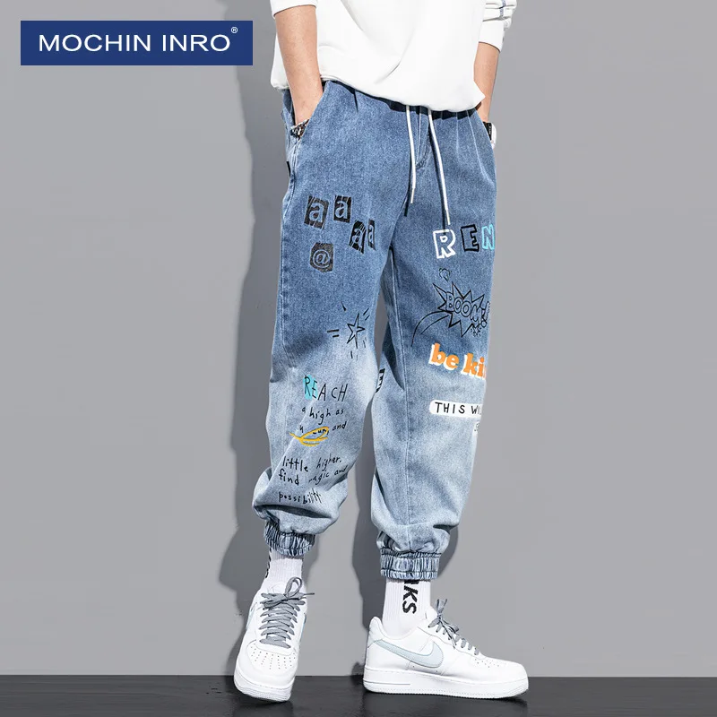 

Джинсы мужские с широкими штанинами, уличная мода, Свободные повседневные штаны с принтом граффити, брюки для бега в стиле хип-хоп, весна-осе...