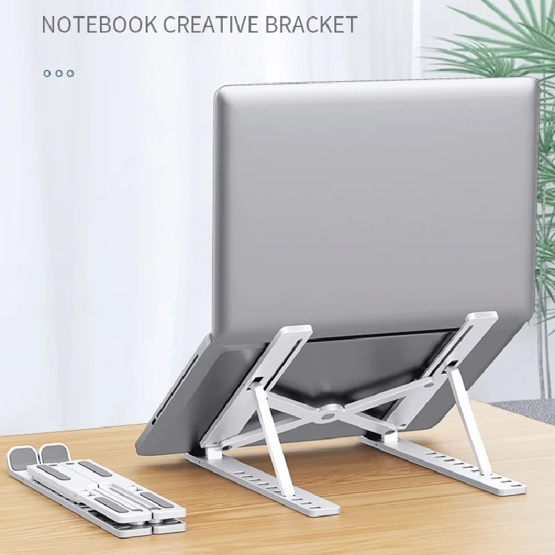 

Creative New Laptop Stand Lifting and Foldable Portable Desktop Stand Computer Cooling Rack