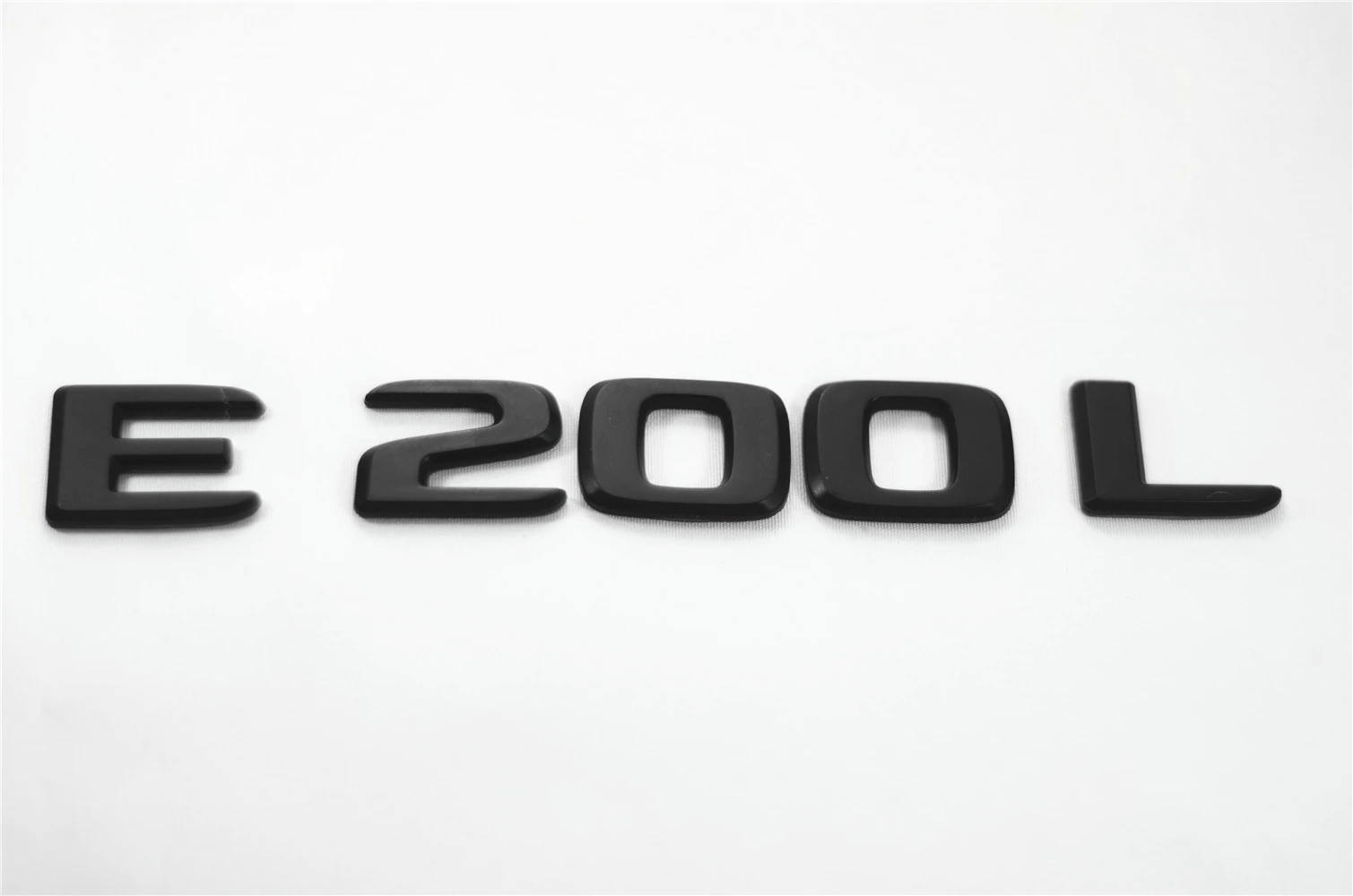

Emblem Badge Matt Black Decal Trunk Rear ABS for Mercedes Benz E220Ld E250L E200Ld E300L E220L E200L Car Sticker Decoration
