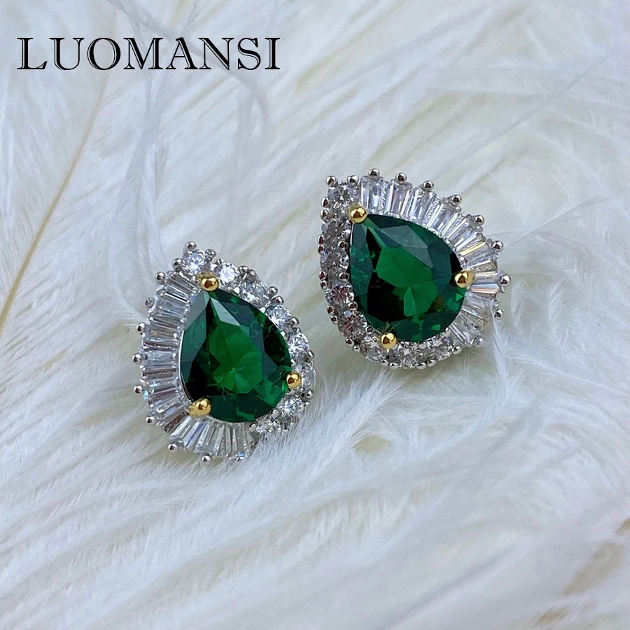 

Женские серьги-подвески из серебра 100% пробы с изумрудами