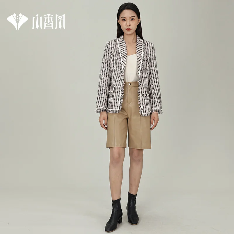 

Xiaoxiangfeng 2021 autumn and winter coat new small suit short suit celebrity French high sense women's dr