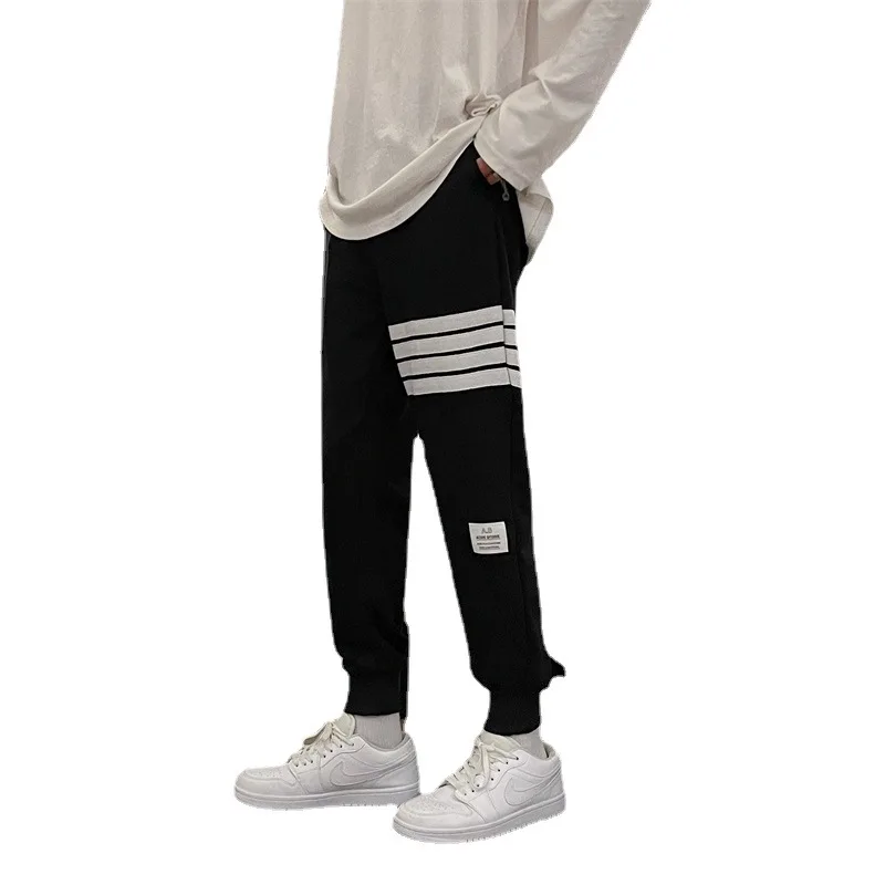 

Stripe Sports Pants Street Men Women Loose Drawstring Casual Fashion Jogging Four Bars Elastic Waist Sweatpants Couple Trousers