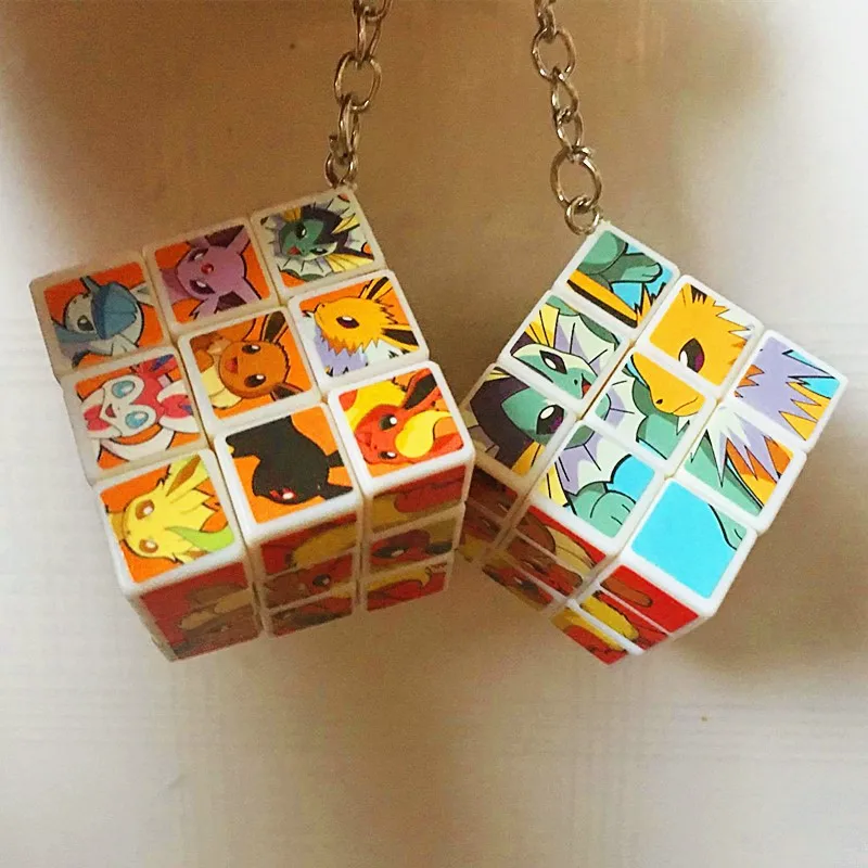 

Anime Pokemon Keychain Pikachu Eevee Figures Print Cube Pendant Key Chain Children&#39s Toys Keyring Christmas Gift Random One