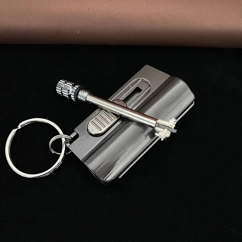 

Metal Permanent Match Lighter With Knife Outdoor Waterproof Gasoline Keychain Flint Lighter Fire Starter Survival Tool Gadget