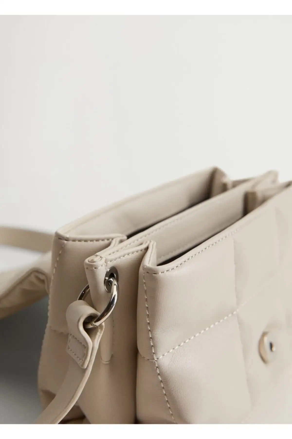 

Quilted Messenger Bag