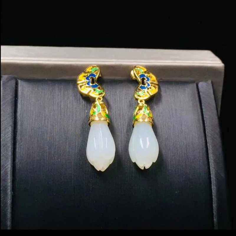 

Серьги-гвоздики женские из серебра 925 пробы с вырезанными цветами магнолии и белым нефритом