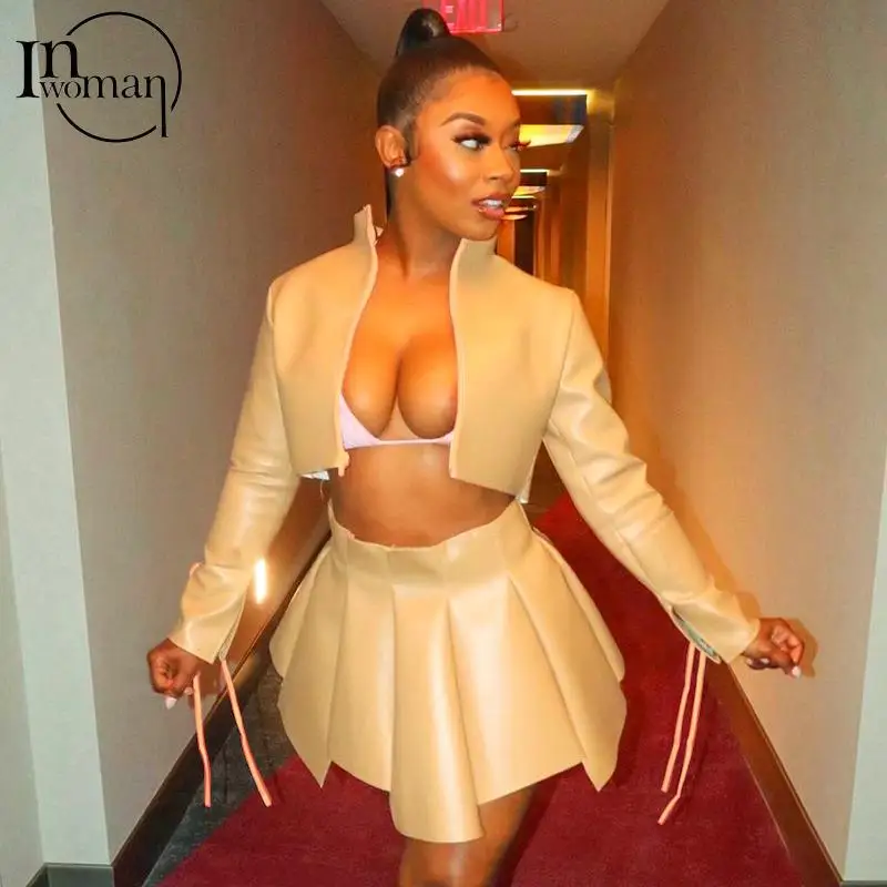 

INWOMAN Autumn Sexy 2 Two Piece Sets Women Skirts 2021 O Neck Long Sleeve Crop Top Leather Club Skirts Suits Female Matching Set