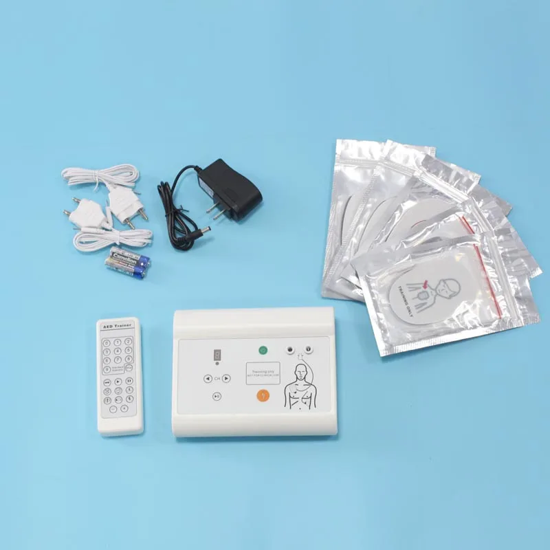 Шиньон первой помощи AED дефибриллятор симуляция Учебная модель медицинская